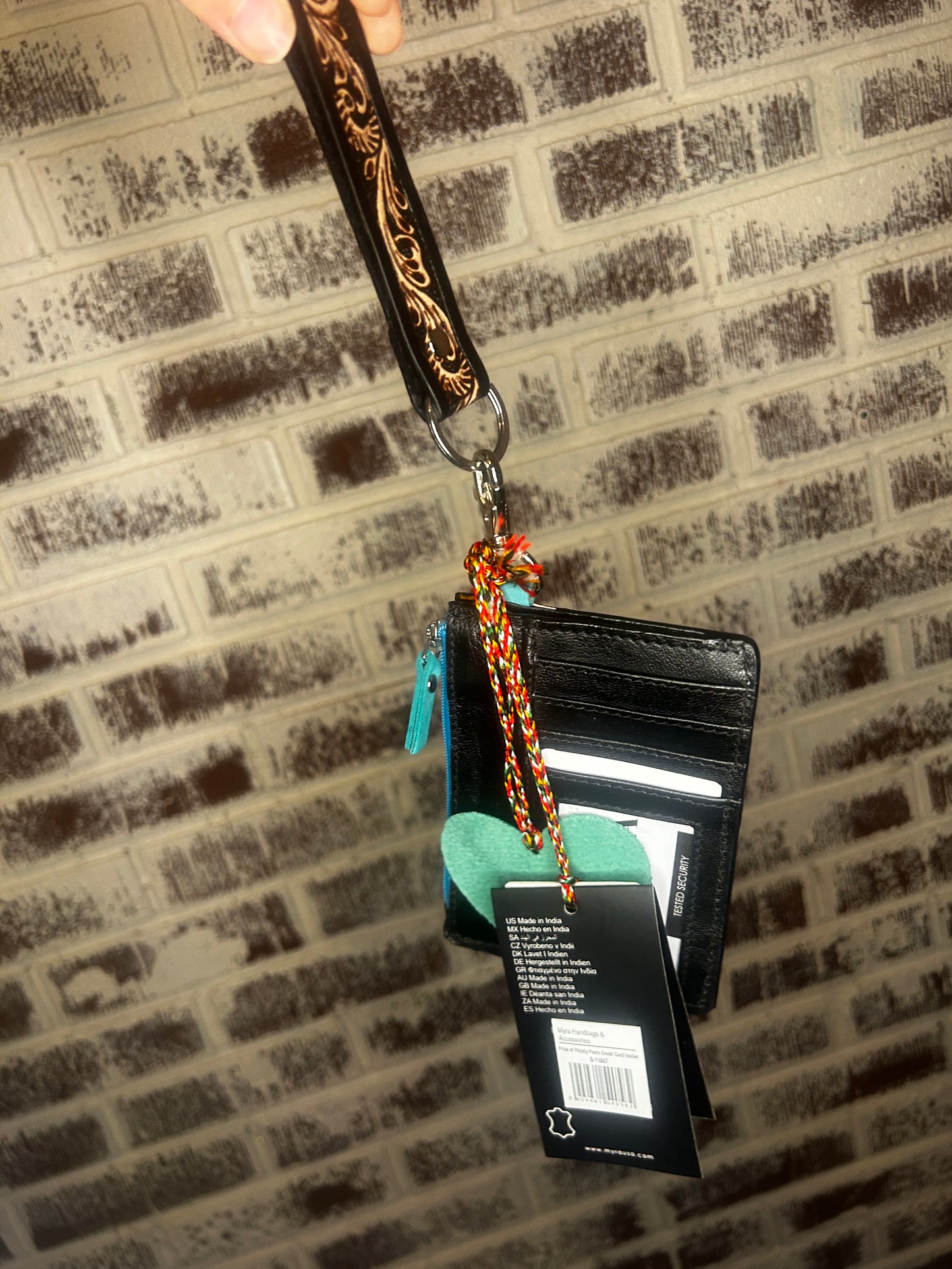 Dark tooled keychain wristlet